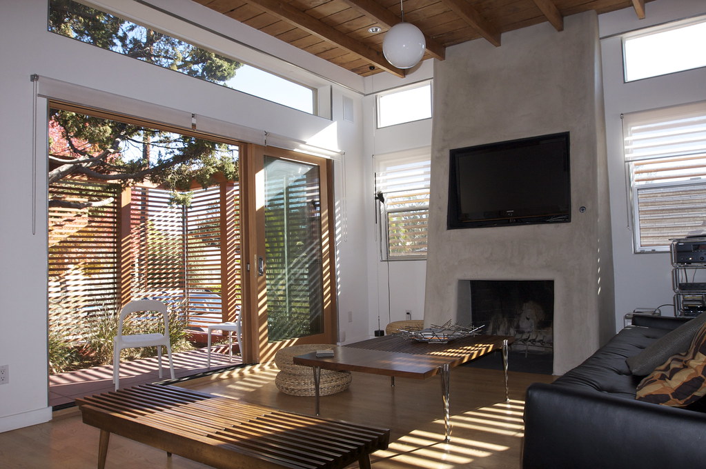 The living room with the fireplace, late afternoon